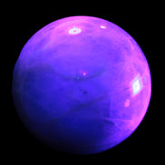 Green Fluorite sphere 108mm 2056g in UV light - Rocks and Things Store