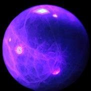 Green Fluorite sphere 108mm 2056g in UV light - Rocks and Things Store