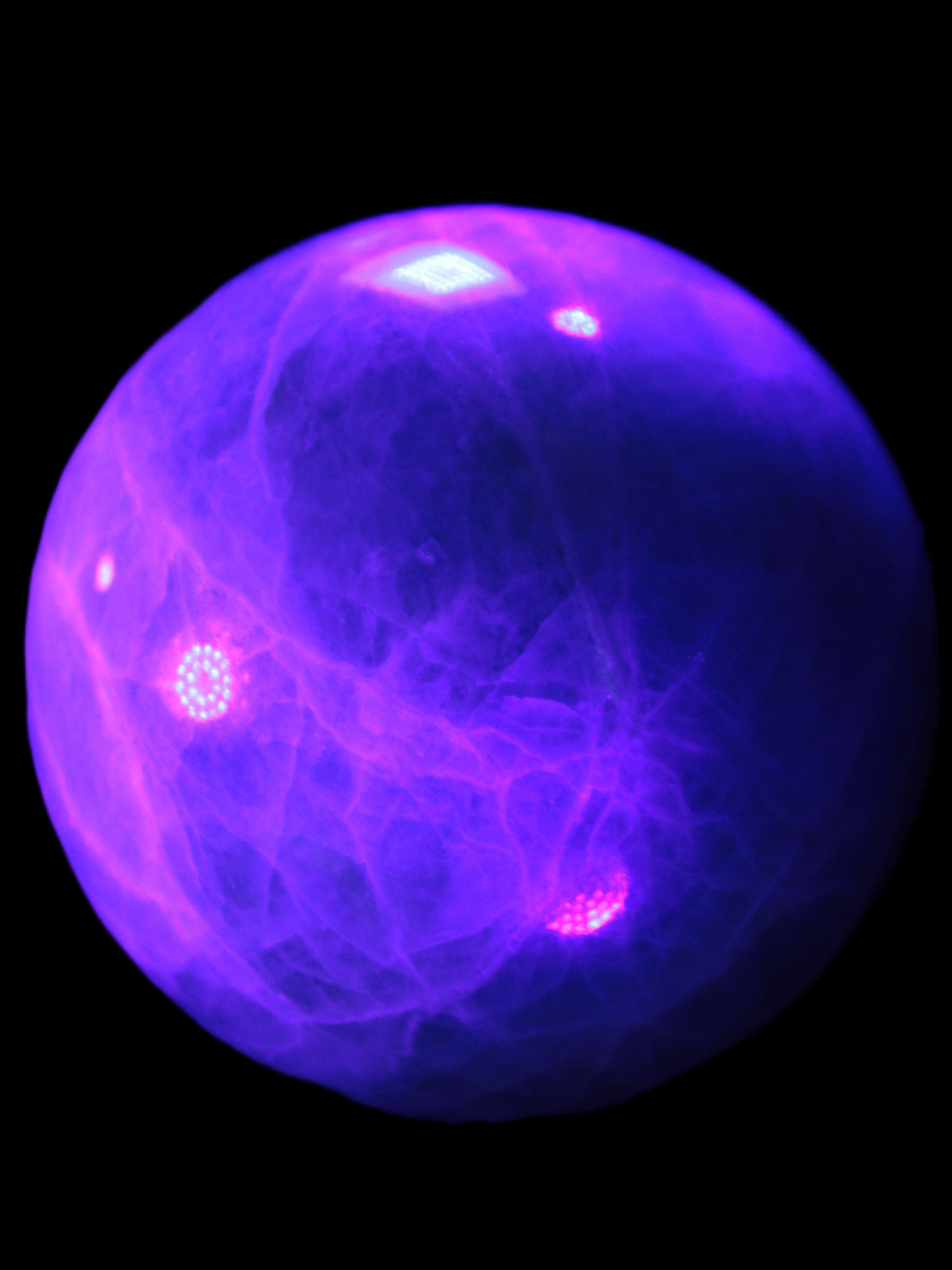 Green Fluorite sphere 108mm 2056g in UV light - Rocks and Things Store