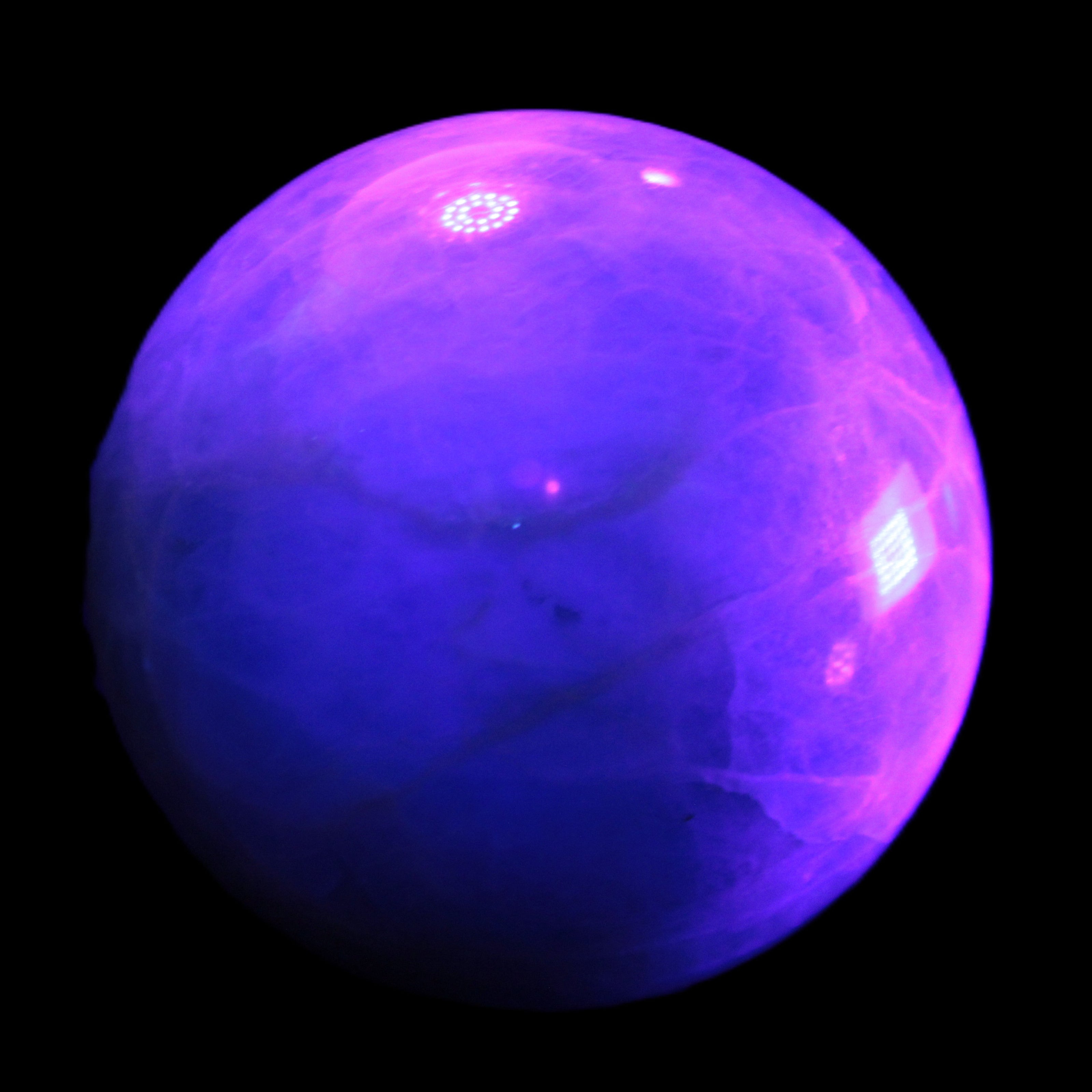 Green Fluorite sphere 108mm 2056g in UV light - Rocks and Things Store