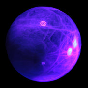 Green Fluorite sphere 108mm 2056g in UV light - Rocks and Things Store