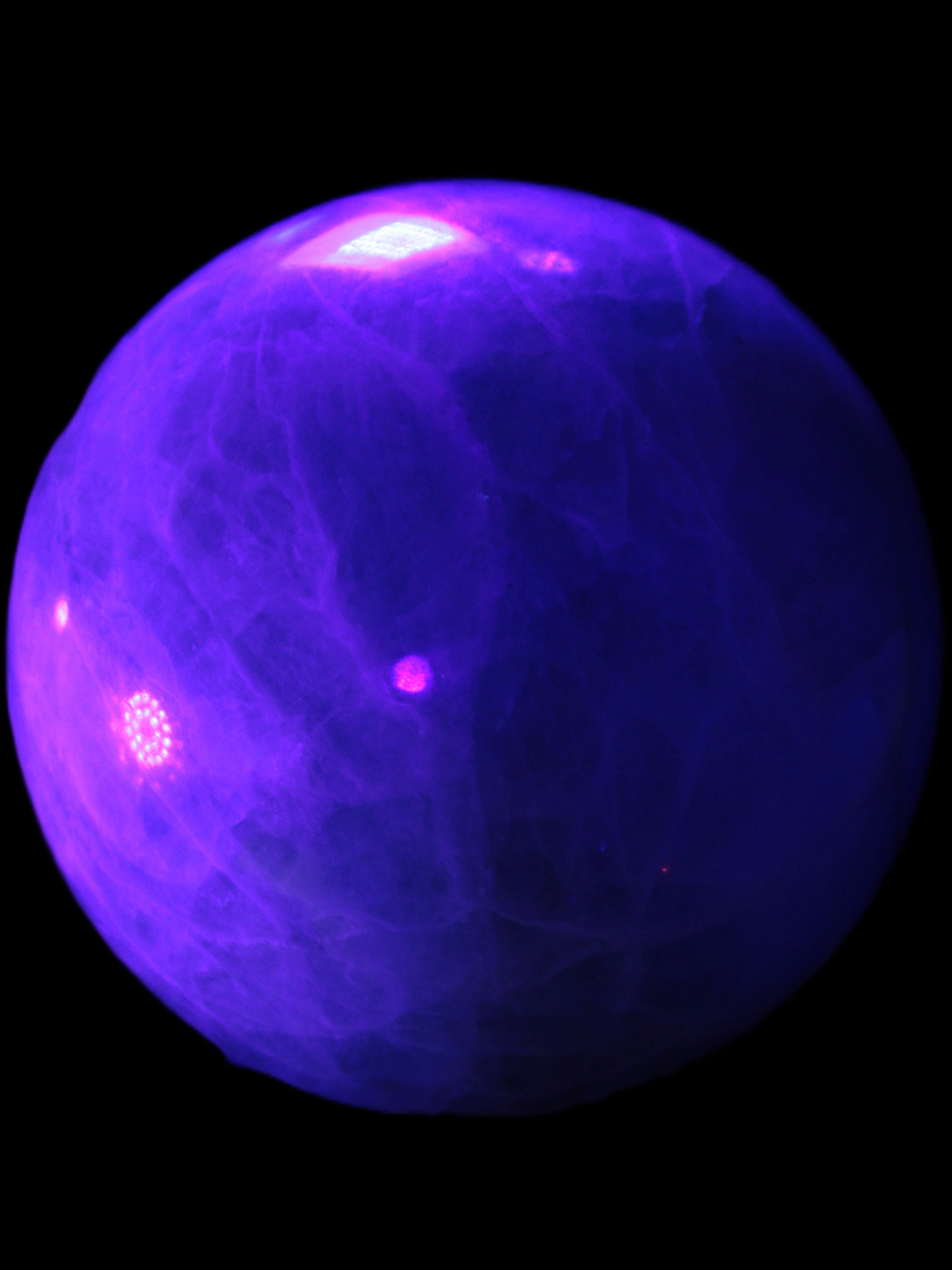 Green Fluorite sphere 108mm 2056g in UV light - Rocks and Things Store