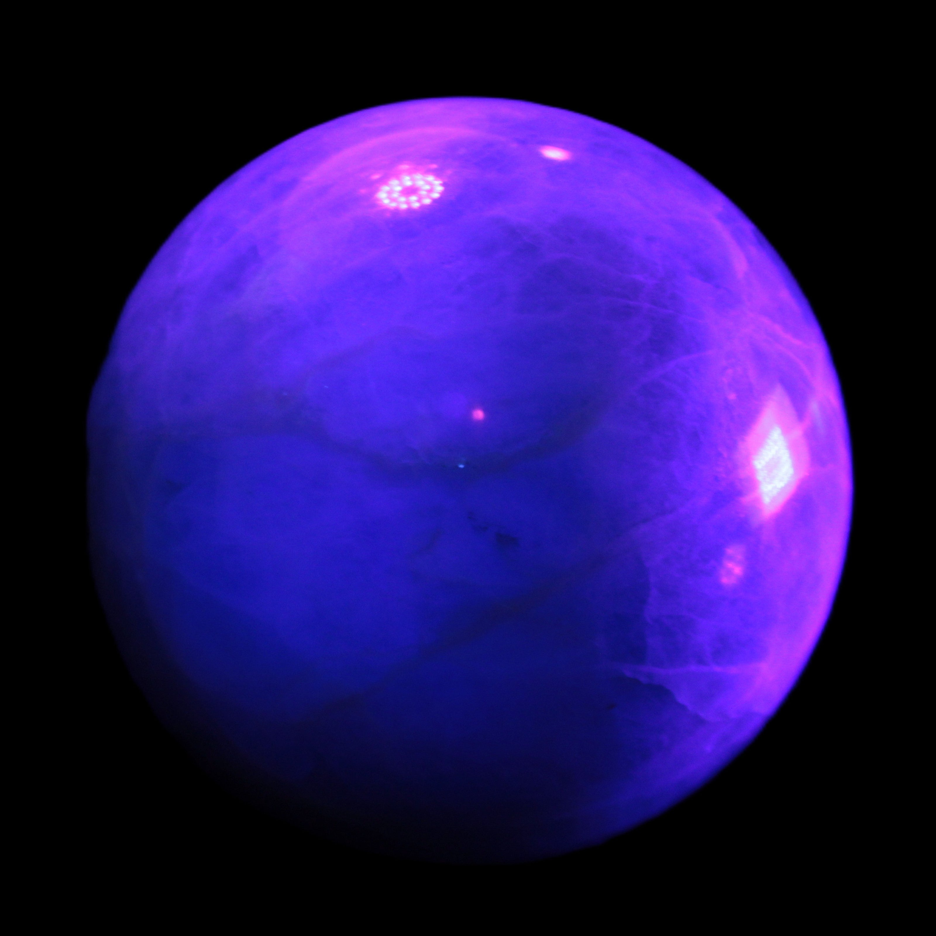 Green Fluorite sphere 108mm 2056g in UV light - Rocks and Things Store