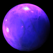 Green Fluorite sphere 108mm 2056g in UV light - Rocks and Things Store