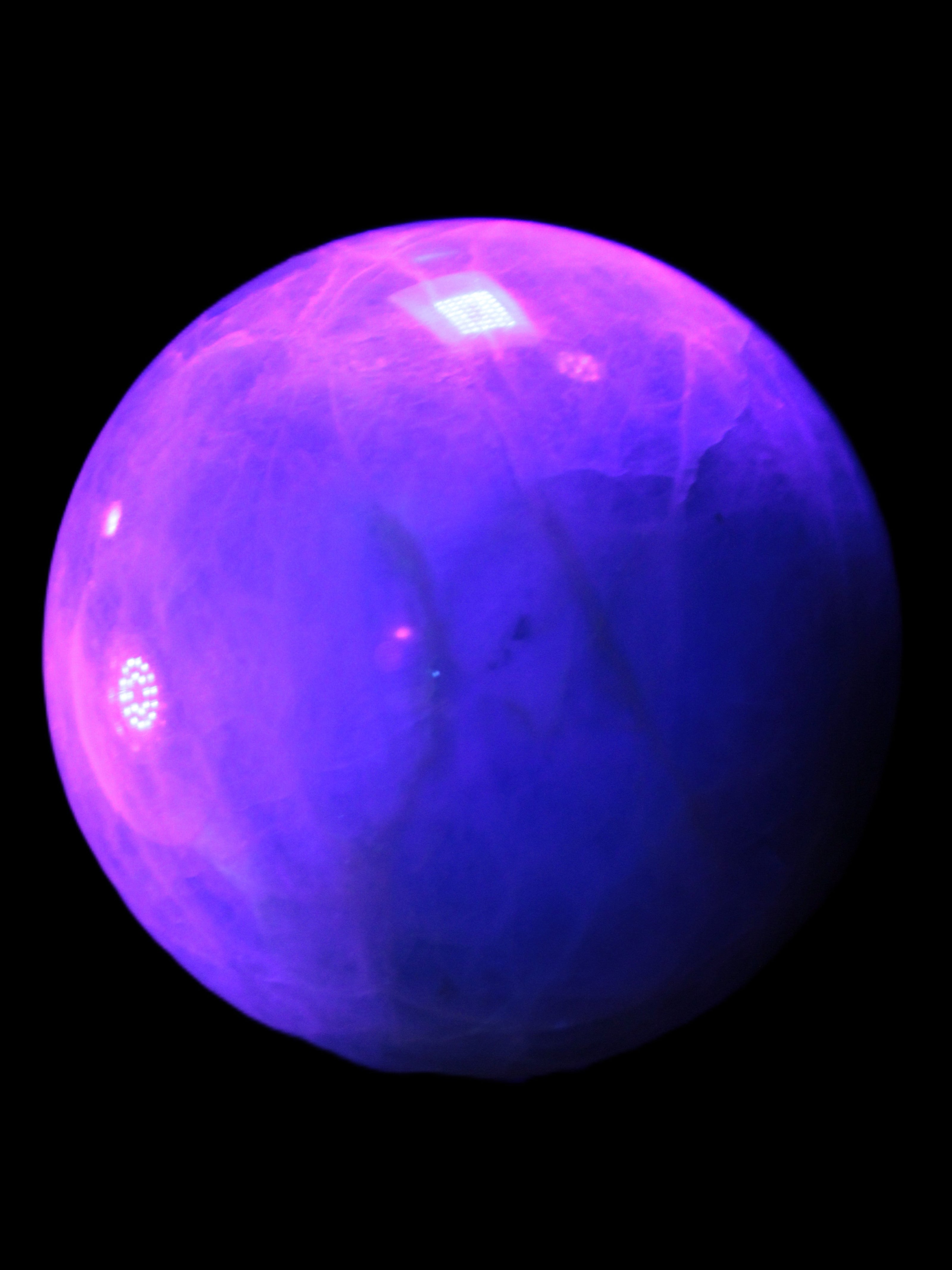 Green Fluorite sphere 108mm 2056g in UV light - Rocks and Things Store