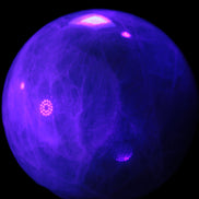 Green Fluorite sphere 108mm 2056g in UV light - Rocks and Things Store