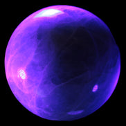 Green Fluorite sphere 108mm 2056g in UV light - Rocks and Things Store