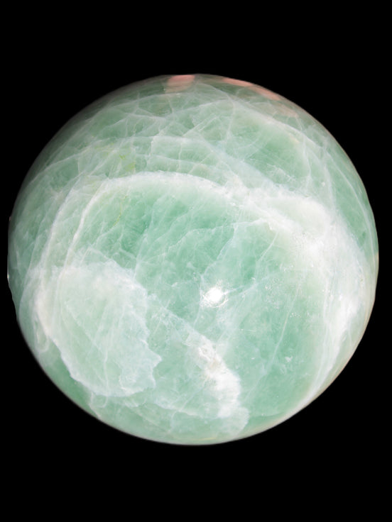Green Fluorite sphere 108mm 2056g in sunlight - Rocks and Things Store