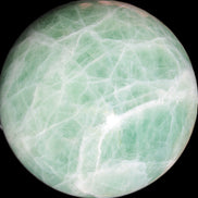 Green Fluorite sphere 108mm 2056g in sunlight - Rocks and Things Store