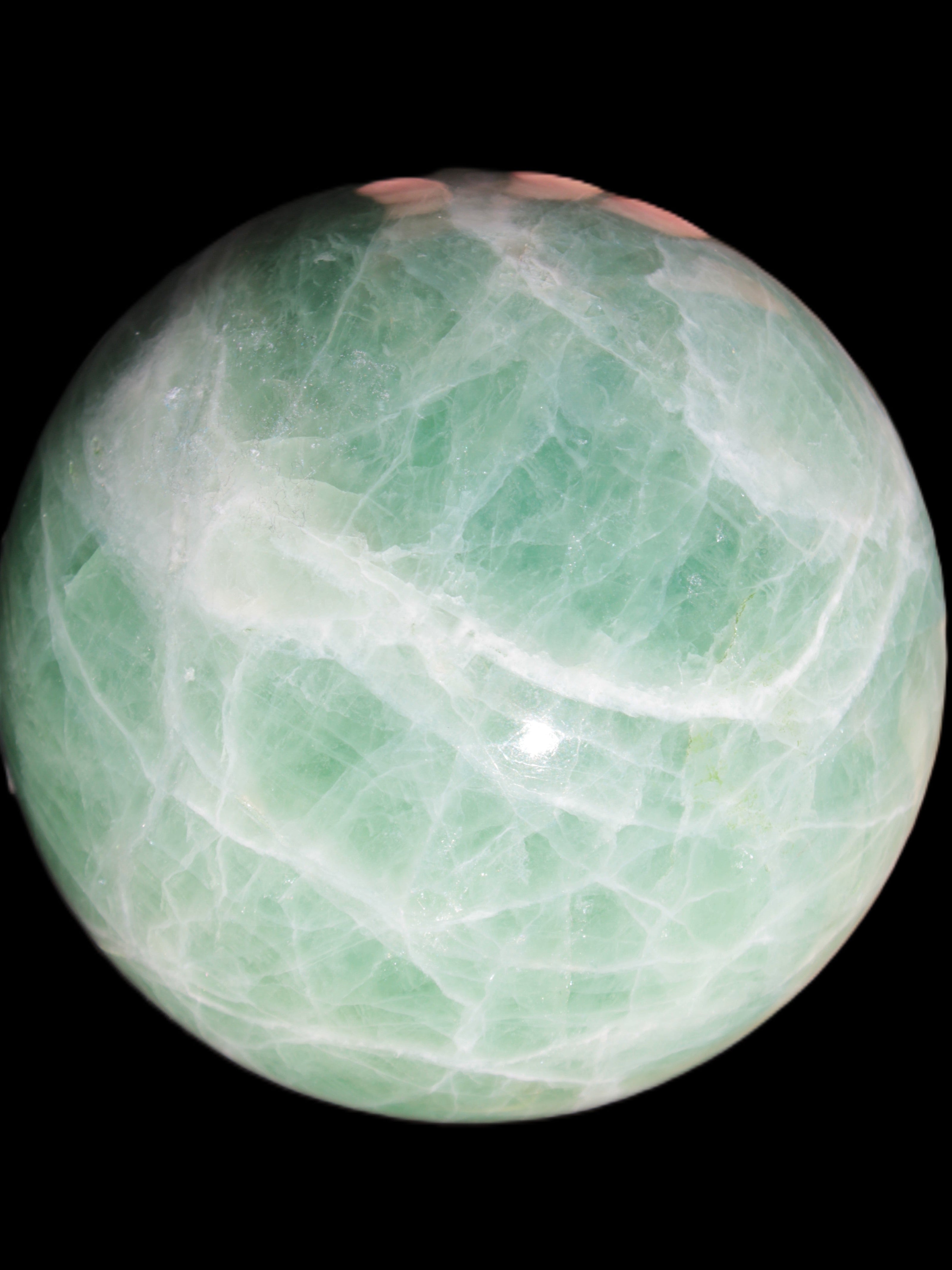Green Fluorite sphere 108mm 2056g in sunlight - Rocks and Things Store