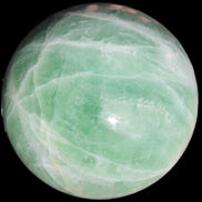 Green Fluorite sphere 108mm 2056g in sunlight - Rocks and Things Store