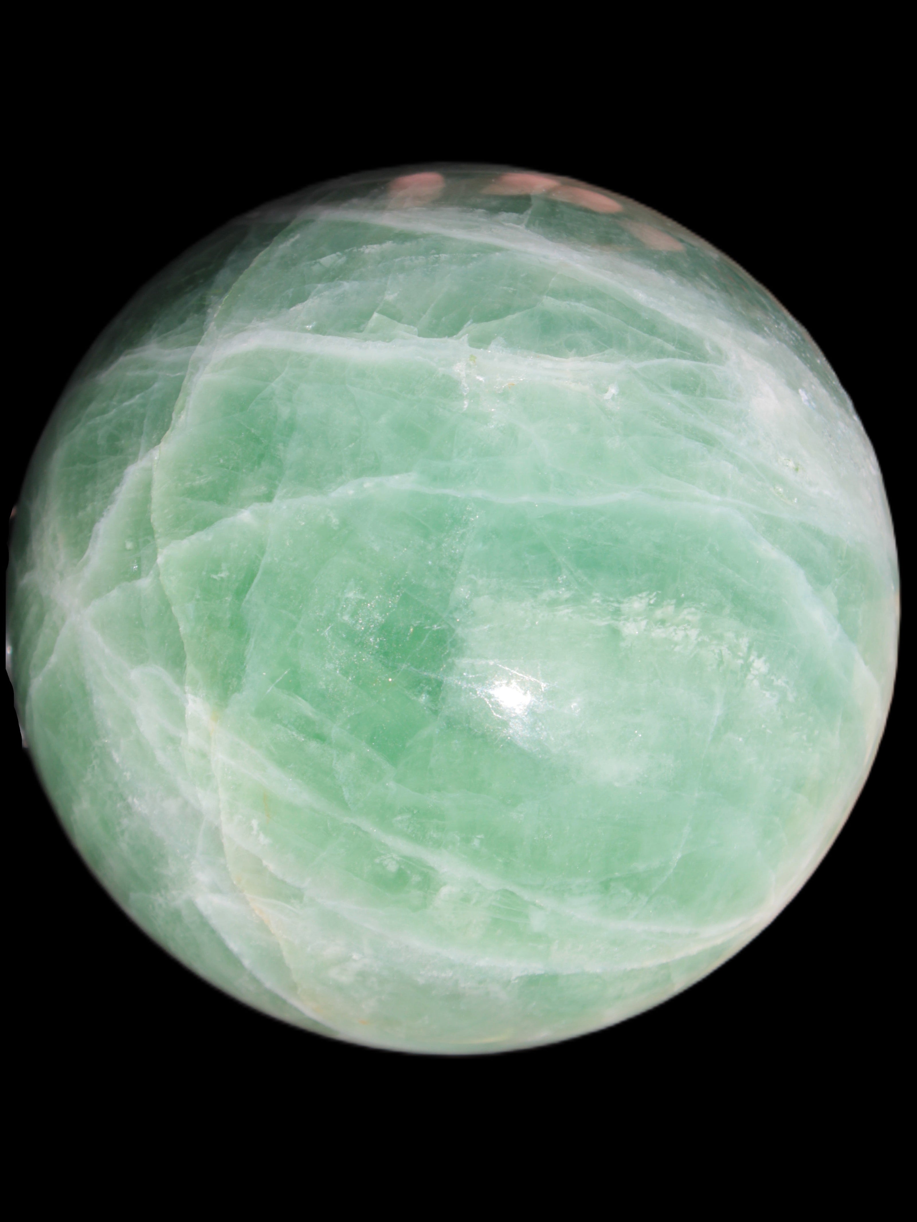 Green Fluorite sphere 108mm 2056g in sunlight - Rocks and Things Store