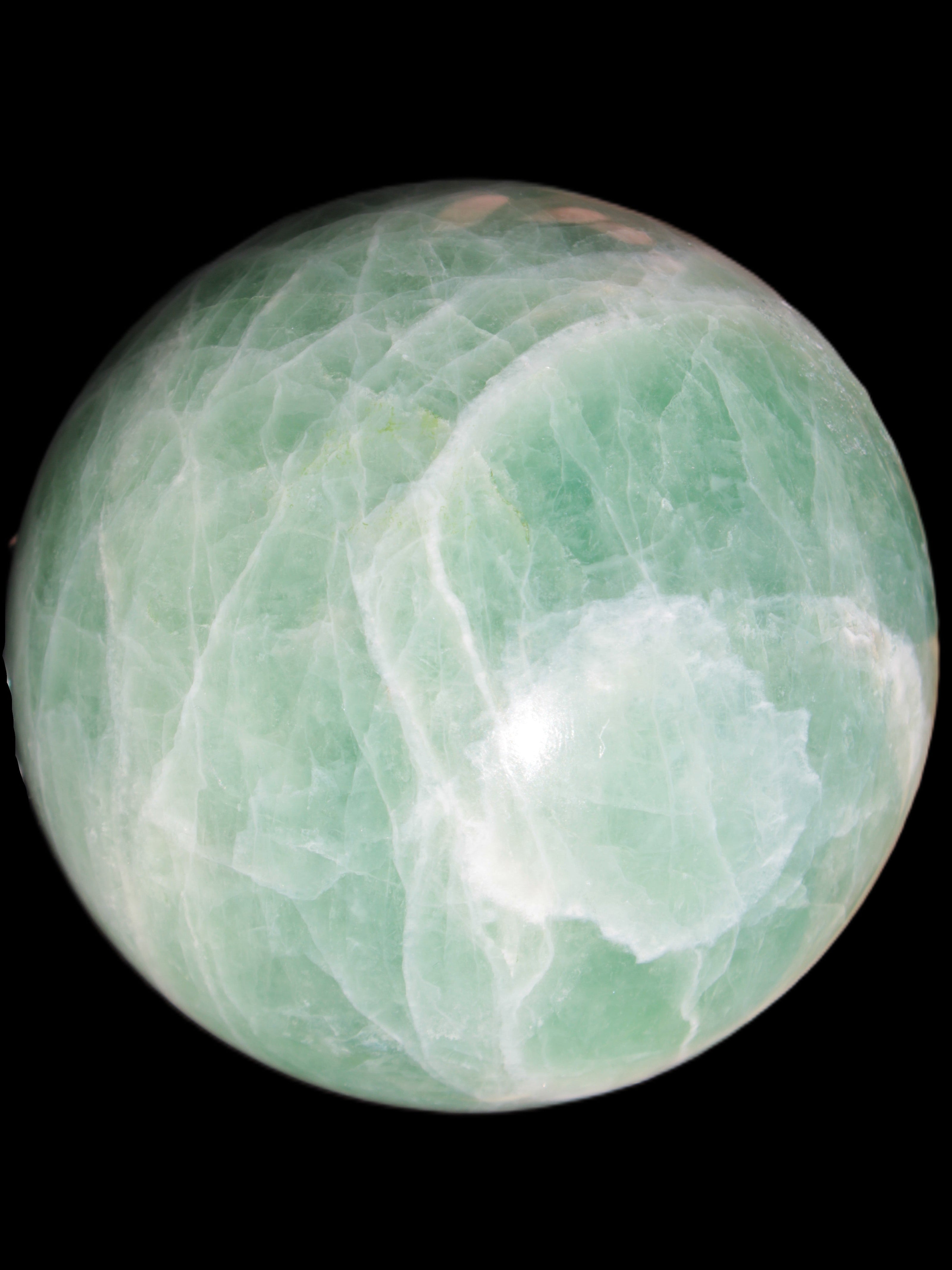 Green Fluorite sphere 108mm 2056g in sunlight - Rocks and Things Store