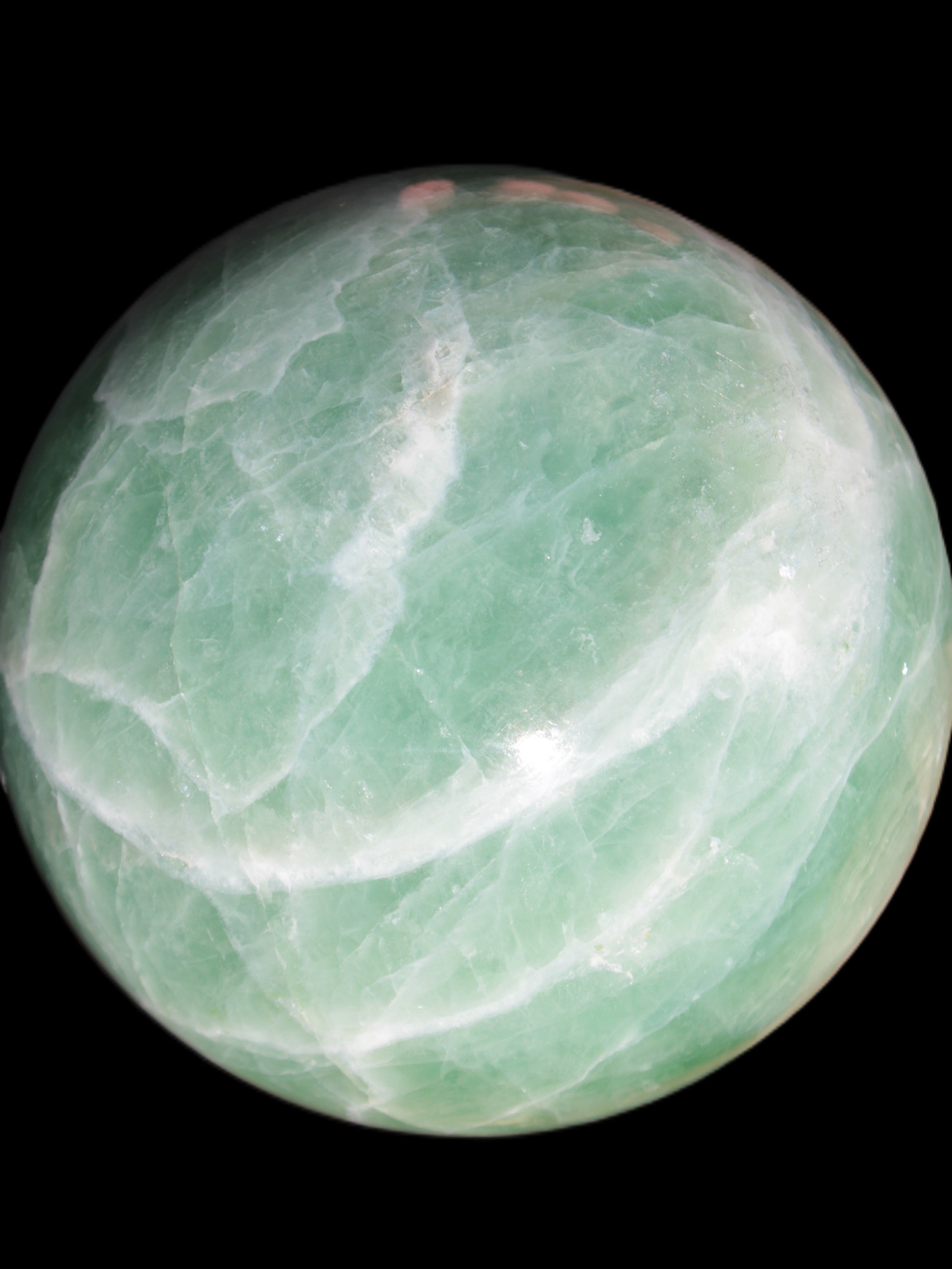Green Fluorite sphere 108mm 2056g in sunlight - Rocks and Things Store