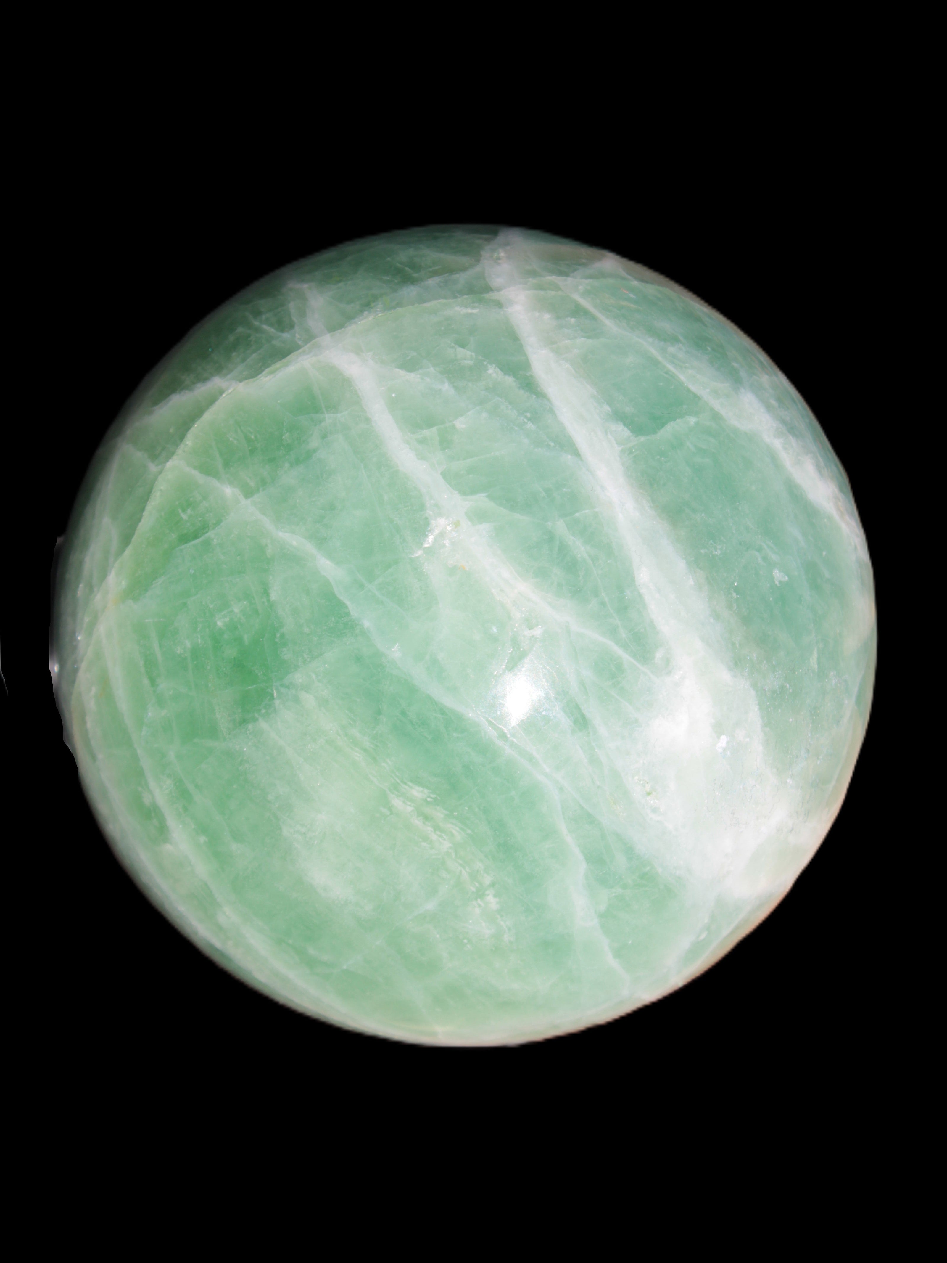 Green Fluorite sphere 108mm 2056g in sunlight - Rocks and Things Store