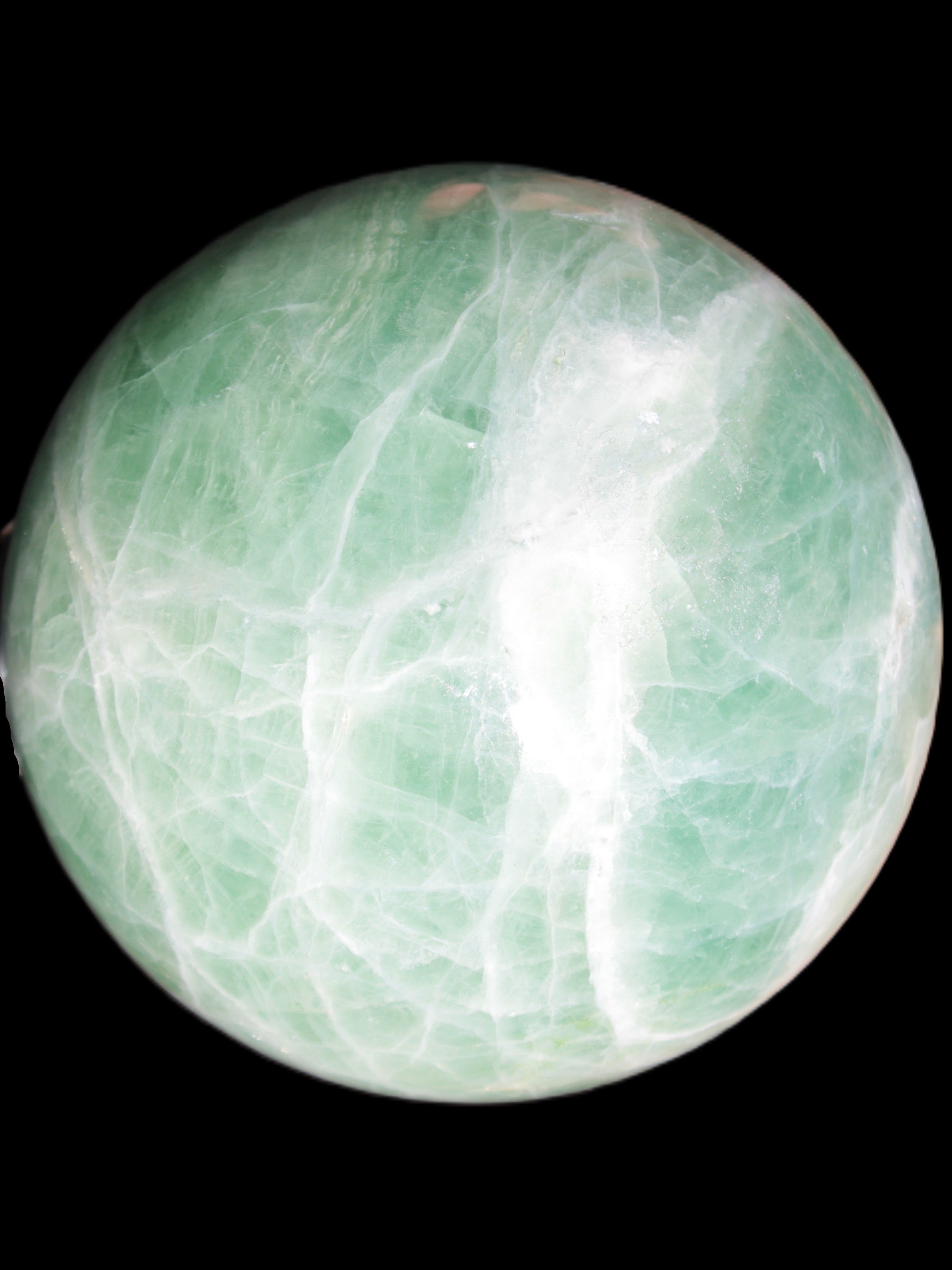Green Fluorite sphere 108mm 2056g in sunlight - Rocks and Things Store