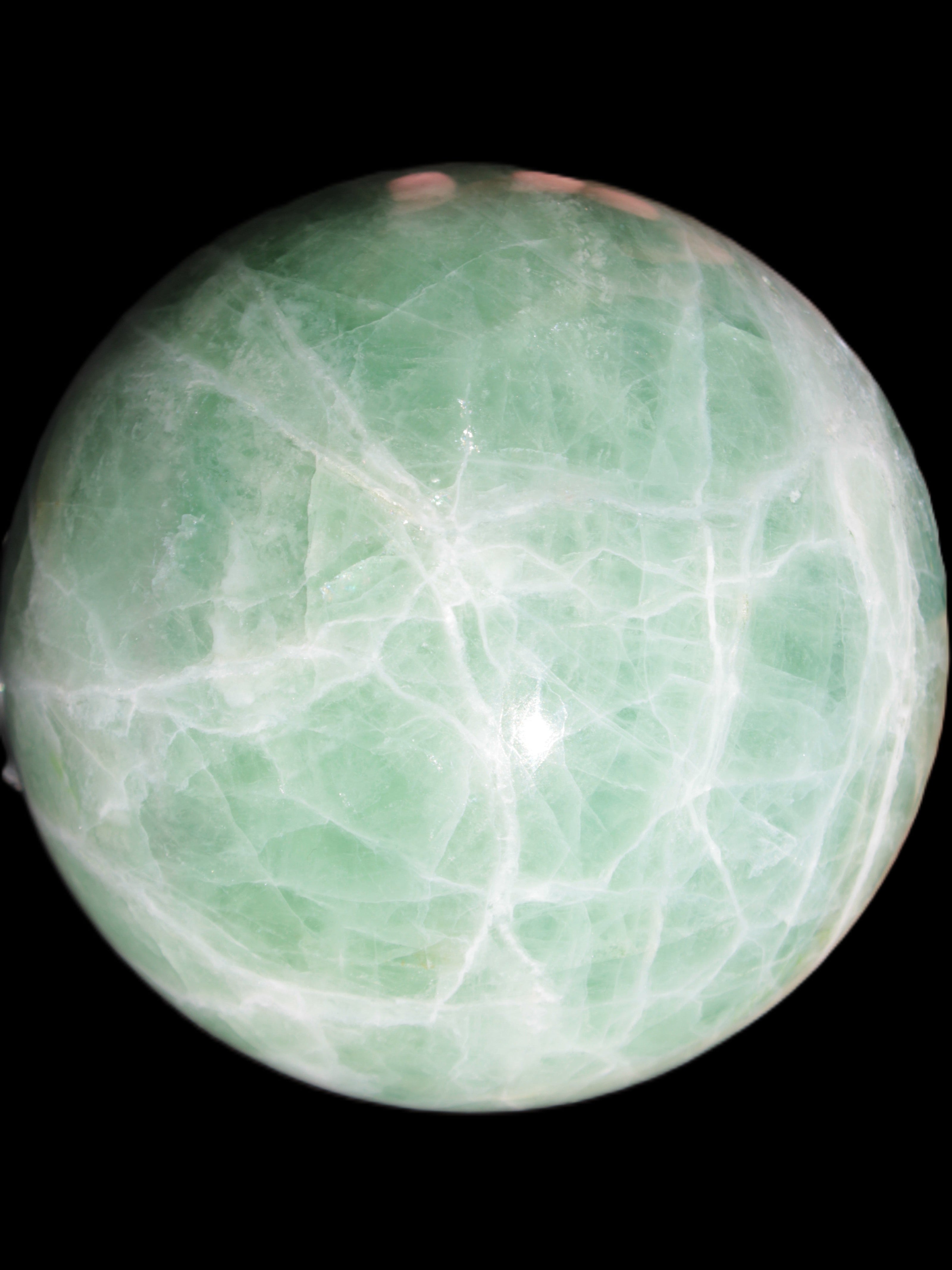 Green Fluorite sphere 108mm 2056g in sunlight - Rocks and Things Store