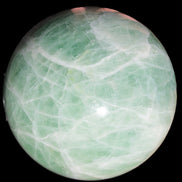 Green Fluorite sphere 108mm 2056g in sunlight - Rocks and Things Store