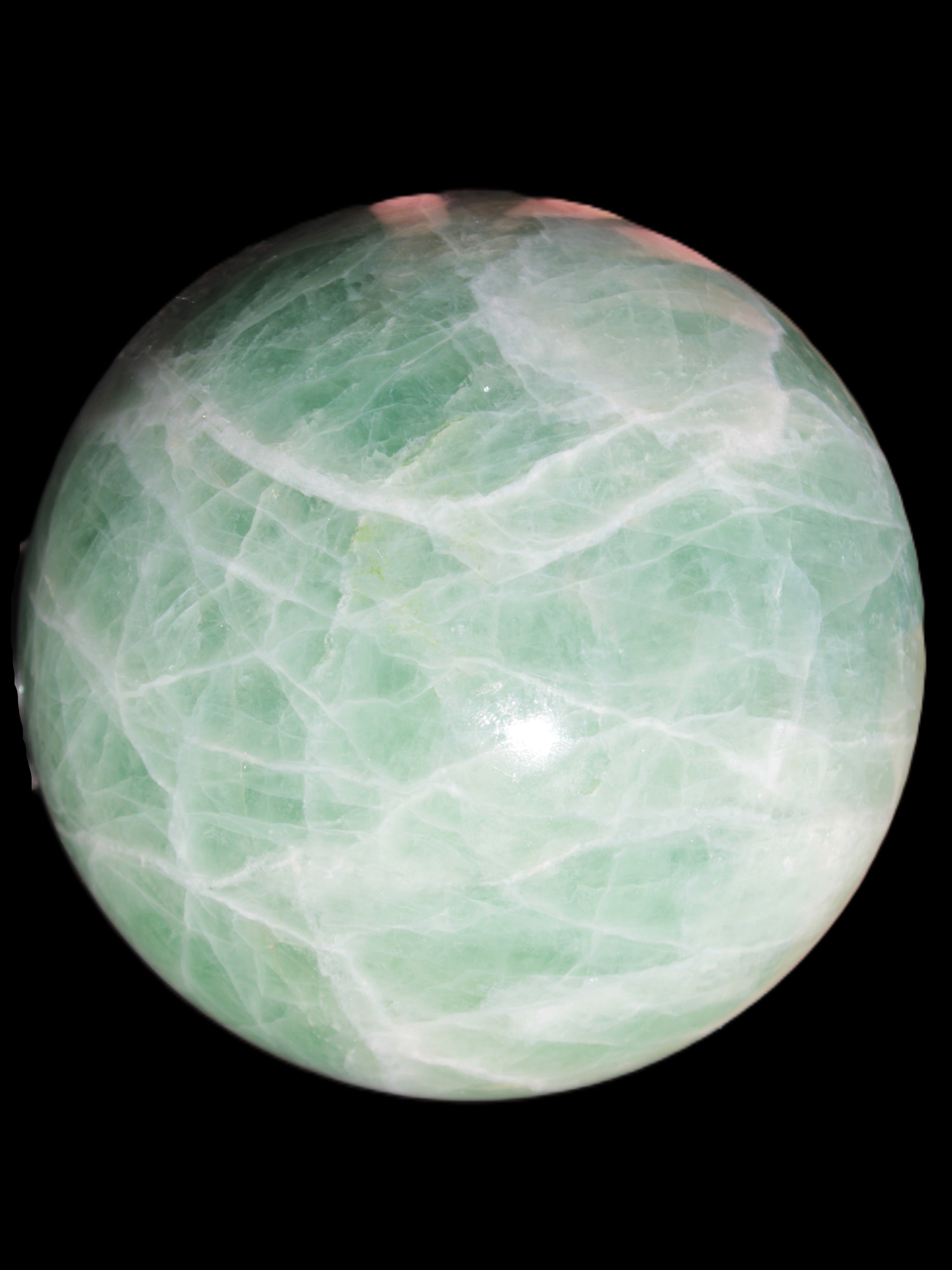 Green Fluorite sphere 108mm 2056g in sunlight - Rocks and Things Store