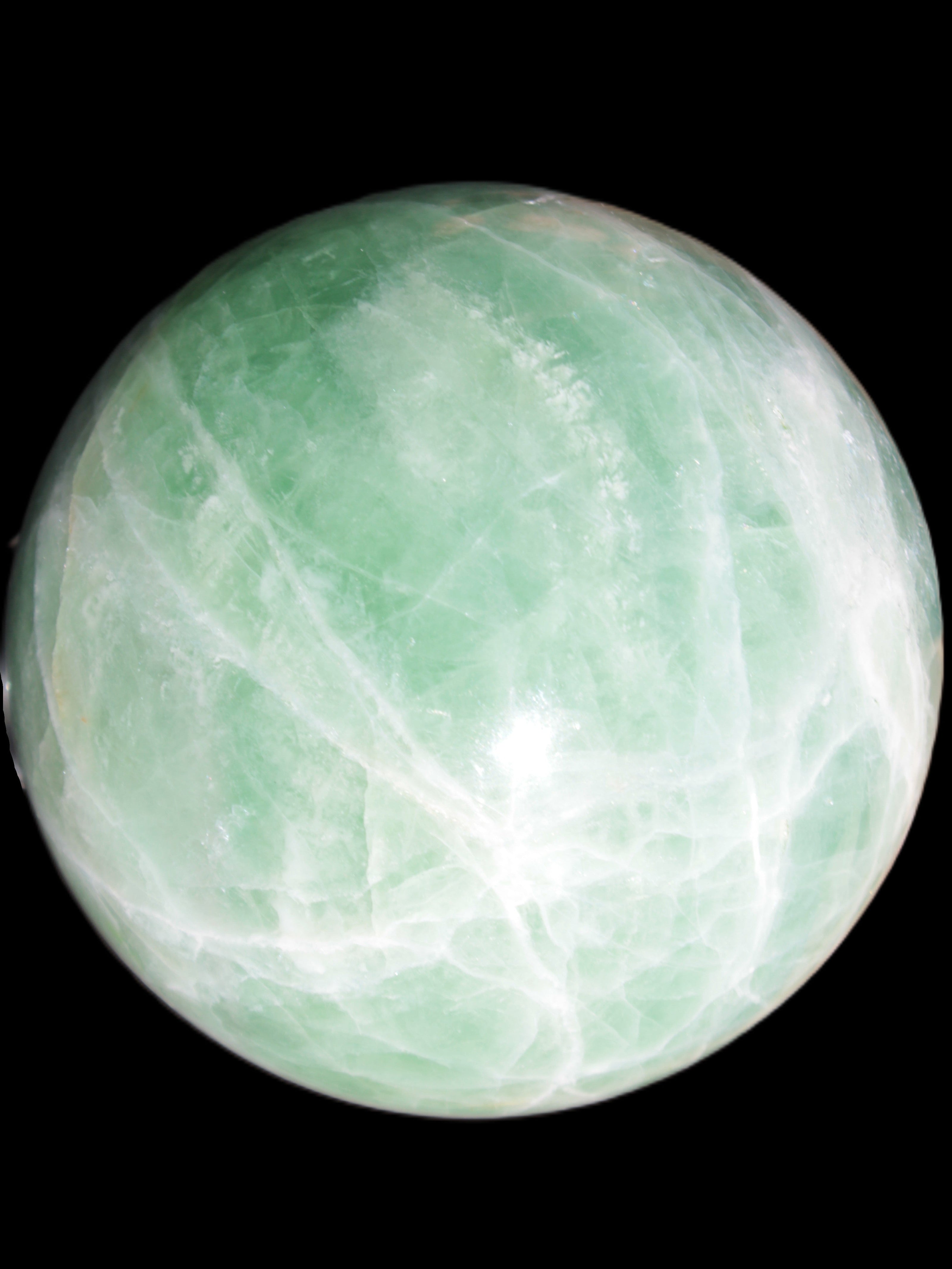 Green Fluorite sphere 108mm 2056g in sunlight - Rocks and Things Store