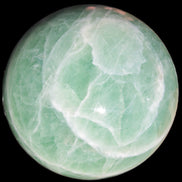 Green Fluorite sphere 108mm 2056g in sunlight - Rocks and Things Store