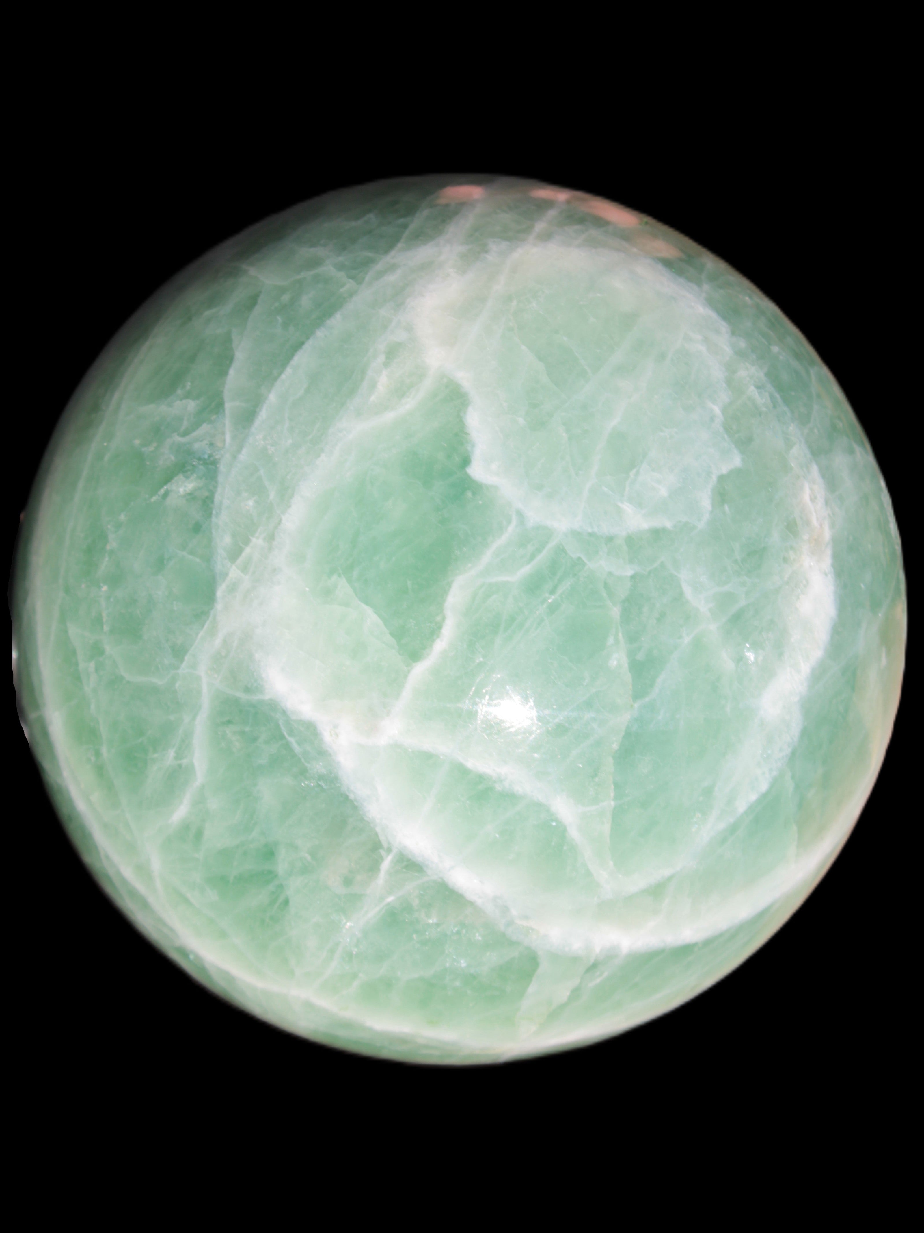 Green Fluorite sphere 108mm 2056g in sunlight - Rocks and Things Store