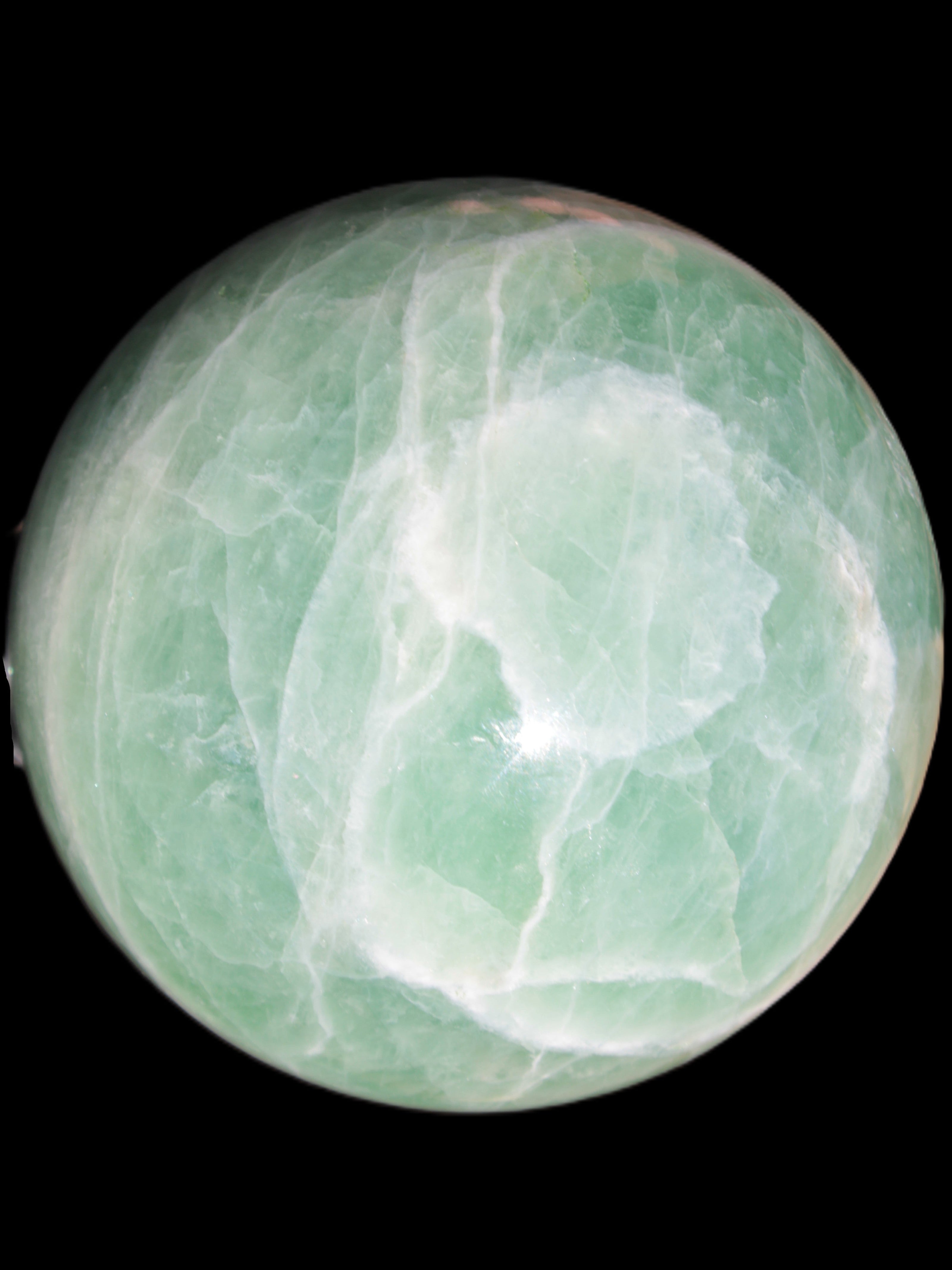 Green Fluorite sphere 108mm 2056g in sunlight - Rocks and Things Store