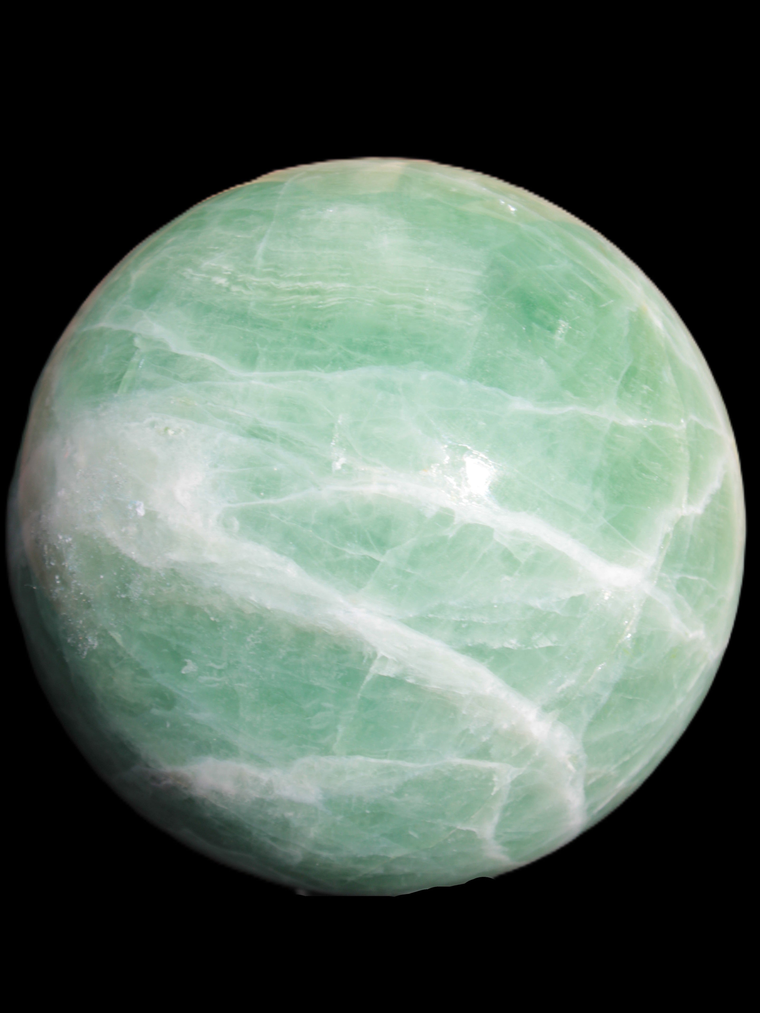 Green Fluorite sphere 108mm 2056g in sunlight - Rocks and Things Store