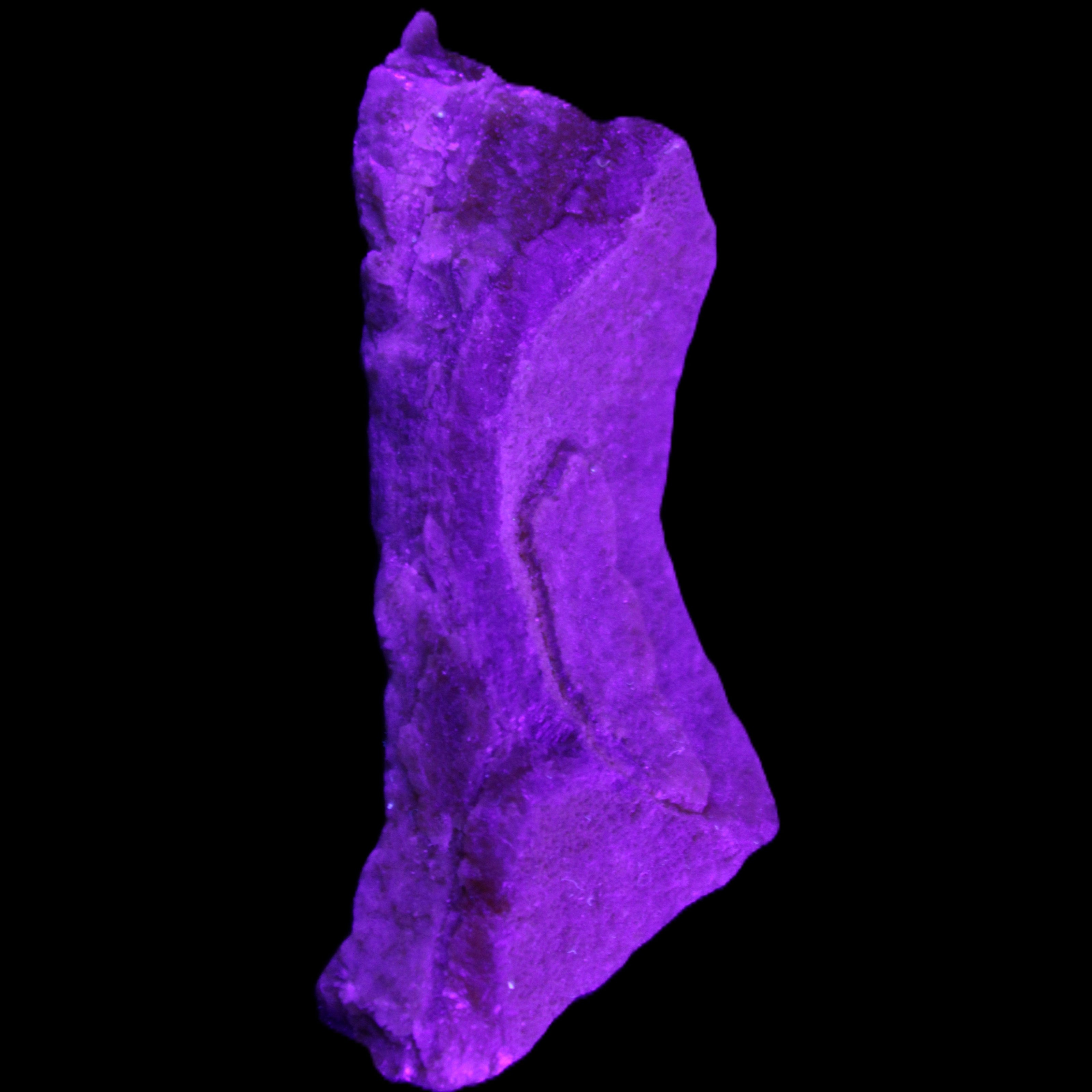 Pink Rhodochrosite crystal 60*23*10mm 27.6g in UV light - Rocks and Things Store