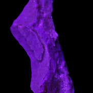 Pink Rhodochrosite crystal 60*23*10mm 27.6g in UV light - Rocks and Things Store