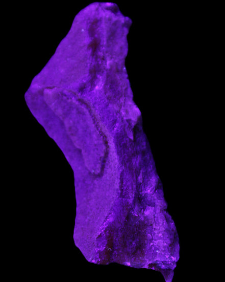 Pink Rhodochrosite crystal 60*23*10mm 27.6g in UV light - Rocks and Things Store