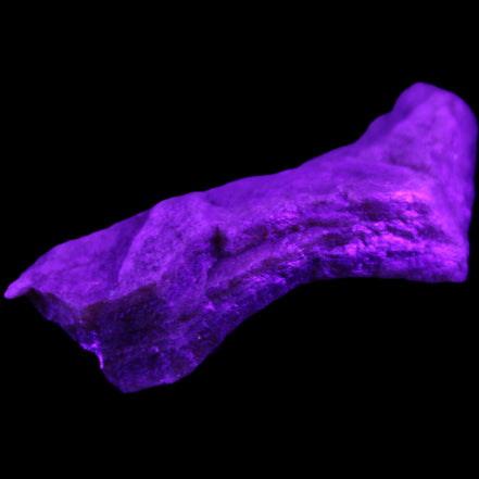 Pink Rhodochrosite crystal 60*23*10mm 27.6g in UV light - Rocks and Things Store