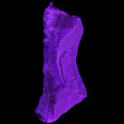 Pink Rhodochrosite crystal 60*23*10mm 27.6g in UV light - Rocks and Things Store