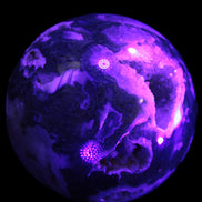 Moss Agate sphere from Madagascar 108mm 1673g in UV light -  Rocks and Things Store