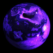 Moss Agate sphere from Madagascar 108mm 1673g in UV light -  Rocks and Things Store