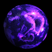 Moss Agate sphere from Madagascar 108mm 1673g in UV light -  Rocks and Things Store