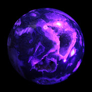 Moss Agate sphere from Madagascar 108mm 1673g in UV light -  Rocks and Things Store