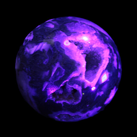 Moss Agate sphere from Madagascar 108mm 1673g in UV light -  Rocks and Things Store