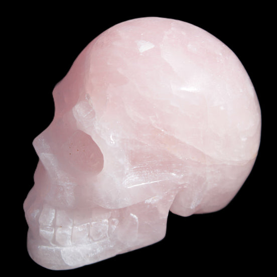 Pink Rose Quartz skull 74*42*54mm 285g in sunlight - Rocks and Things Store