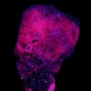 Ruby UV reactive cluster 50*39*11mm 52g Rocks and Things Store