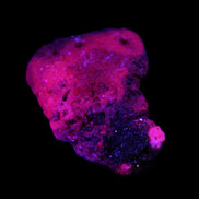 Ruby UV reactive cluster 50*39*11mm 52g Rocks and Things Store