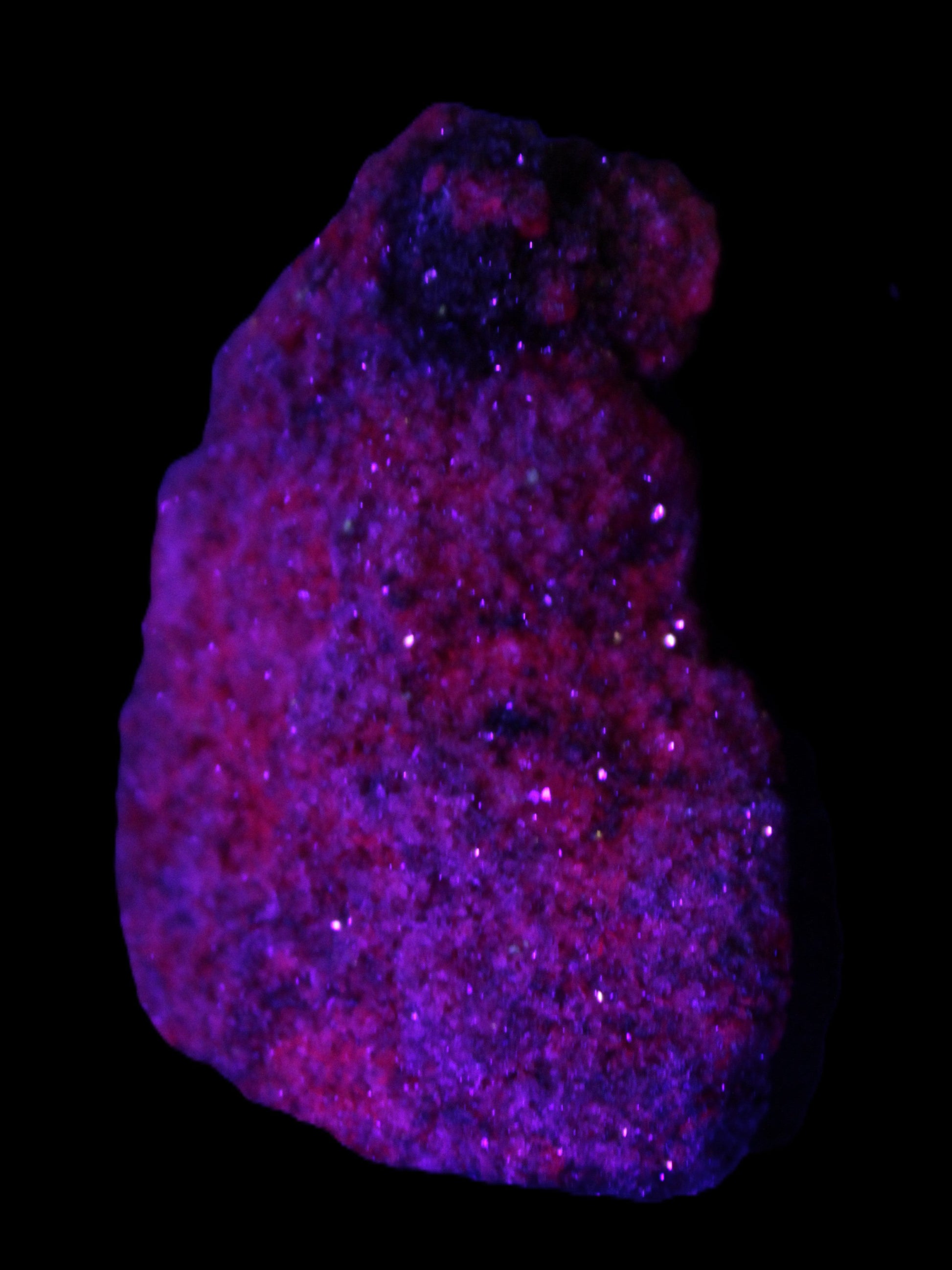 Ruby UV reactive cluster 50*39*11mm 52g Rocks and Things Store