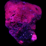 Ruby UV reactive cluster 50*39*11mm 52g Rocks and Things Store