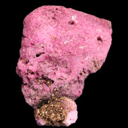 Ruby UV reactive cluster 50*39*11mm 52g in bright sunlight - Rocks and Things