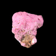 Ruby UV reactive cluster 50*39*11mm 52g in bright sunlight - Rocks and Things Store