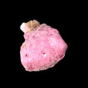 Ruby UV reactive cluster 50*39*11mm 52g in bright sunlight - Rocks and Things Store