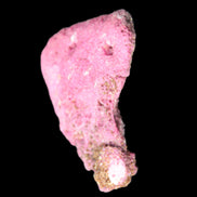 Ruby UV reactive cluster 50*39*11mm 52g in bright sunlight - Rocks and Things Store