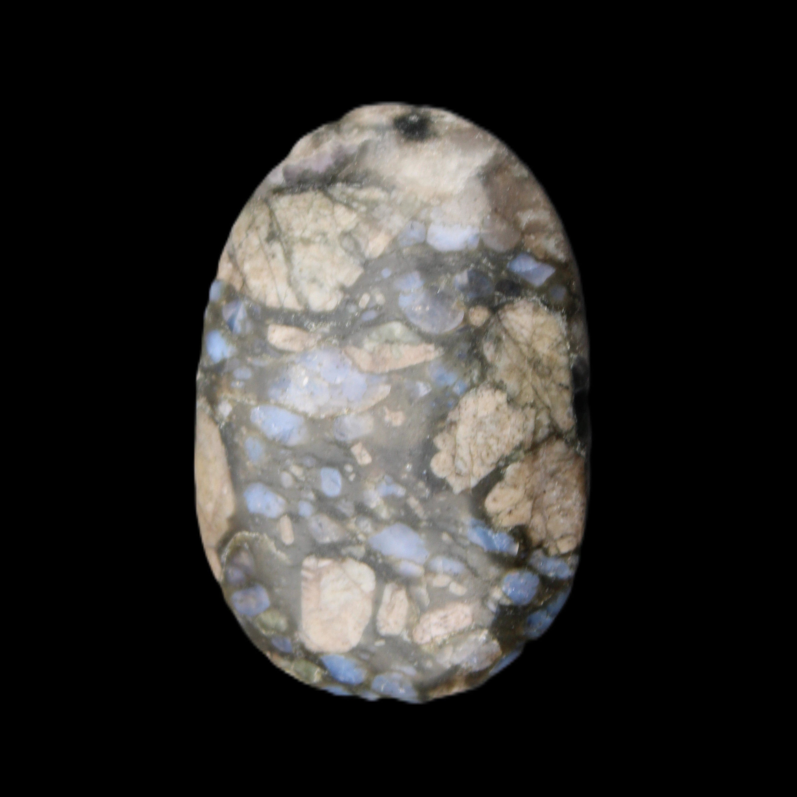 Llanite Que Sera palm stone 52*17*35mm 55g in sunlight - Rocks and Things Store