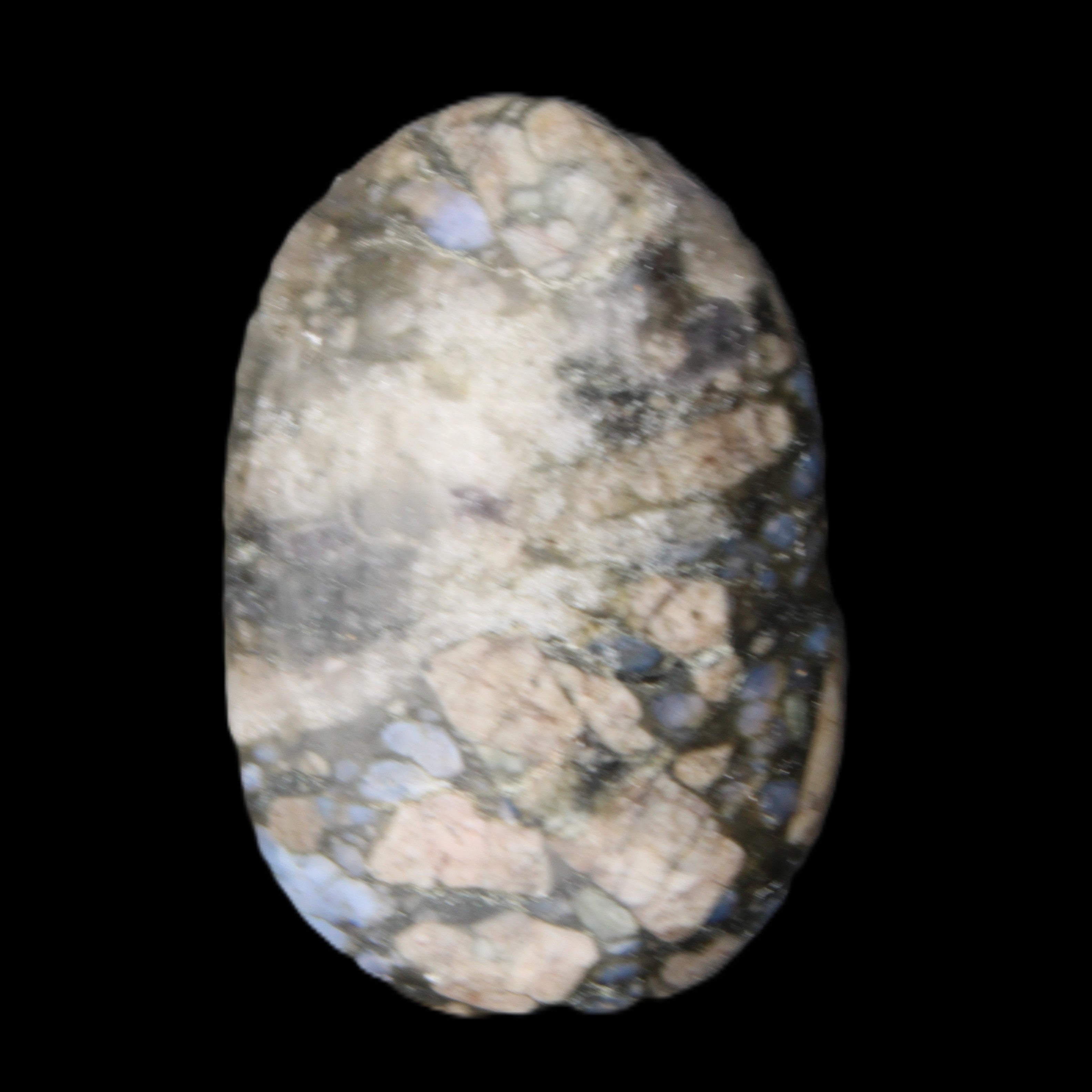 Llanite Que Sera palm stone 52*17*35mm 55g in sunlight - Rocks and Things Store