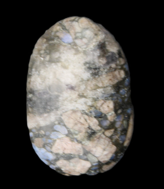Llanite Que Sera palm stone 52*17*35mm 55g in sunlight - Rocks and Things Store
